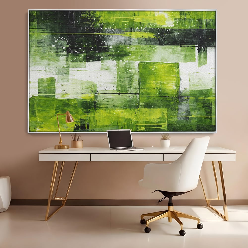 Tablou canvas cu pictura abstracta cu straturi verzi, in rama de aluminiu argintiu, pe perete intr-un birou